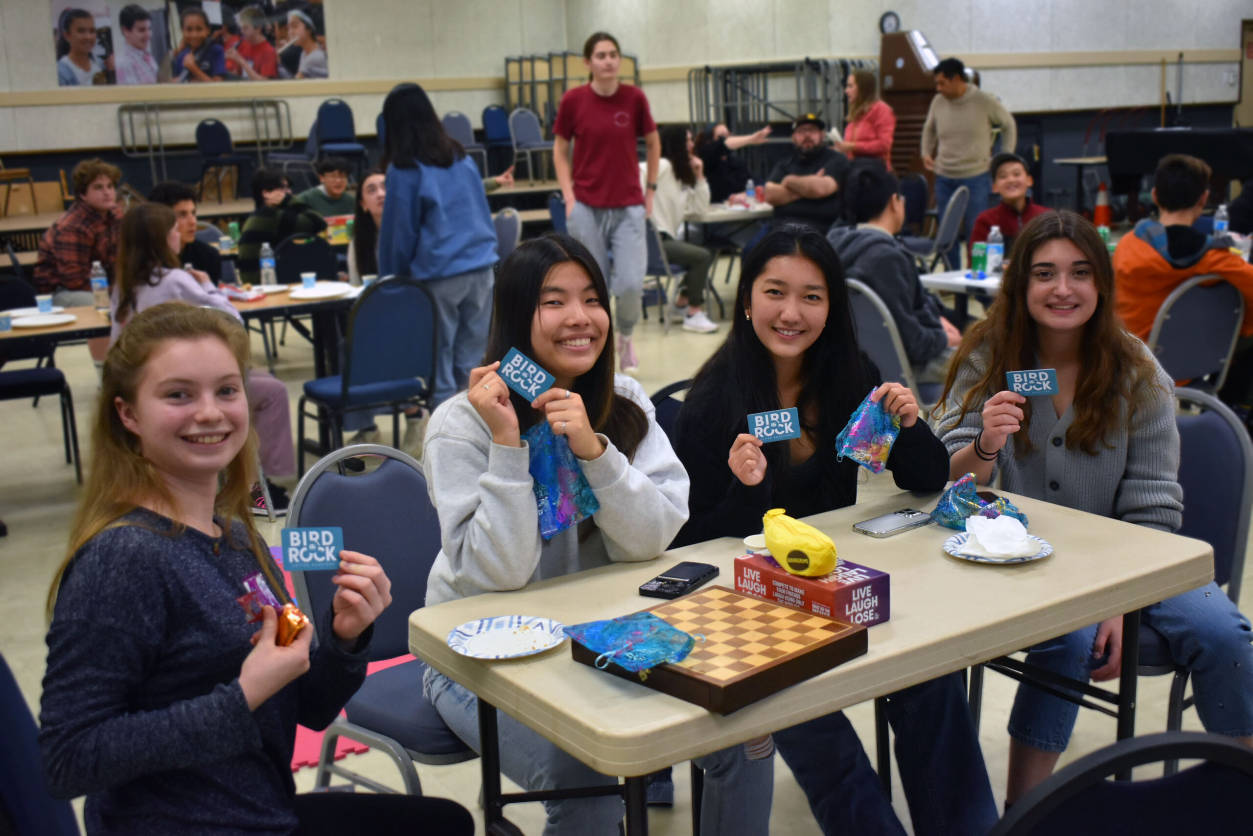 Game winners show off their winnings.